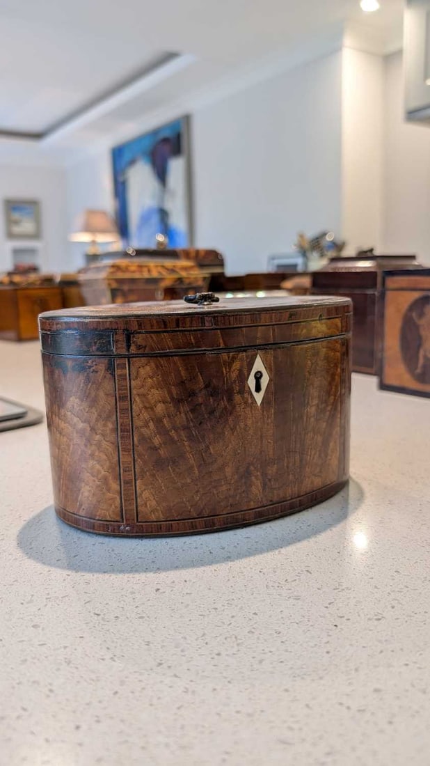 A crossbanded flame veneered tea caddy, - 4