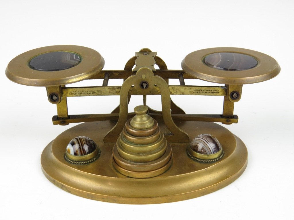 Sampson Mordan & Co., a set of brass letter scales, c: Sampson Mordan & Co., a set of brass letter scales, c.1869-1876, the beam struck twice for retailer 'Howell James & Co, Regent Street, London', each pan and base inset with banded agate cabochons, wit