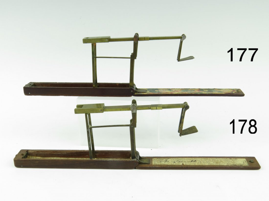 A. Wilkinson, a folding brass guinea balance, c.1780, : A. Wilkinson, a folding brass guinea balance, c.1780, with single turn, the mahogany case with label for 'A. Wilkinson, Ormskirk, Lancashire', 13.5cm
