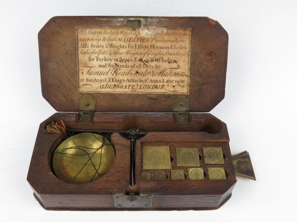 Samuel Read, a set of diamond scales, c.1731-1761, the : Samuel Read, a set of diamond scales, c.1731-1761, the beam with swan neck end, with hemispherical pans, all within a cut from solid mahogany case, the lid with applied printed label, inscribed 'Samue