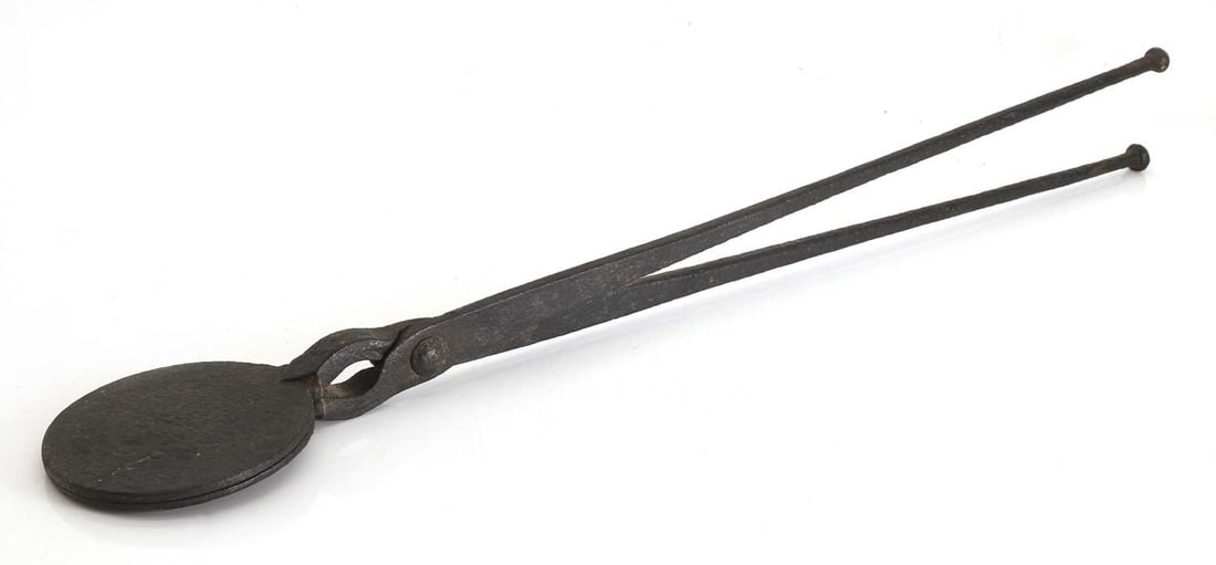 A wrought iron waffle iron, 19th century, (1 of 2)