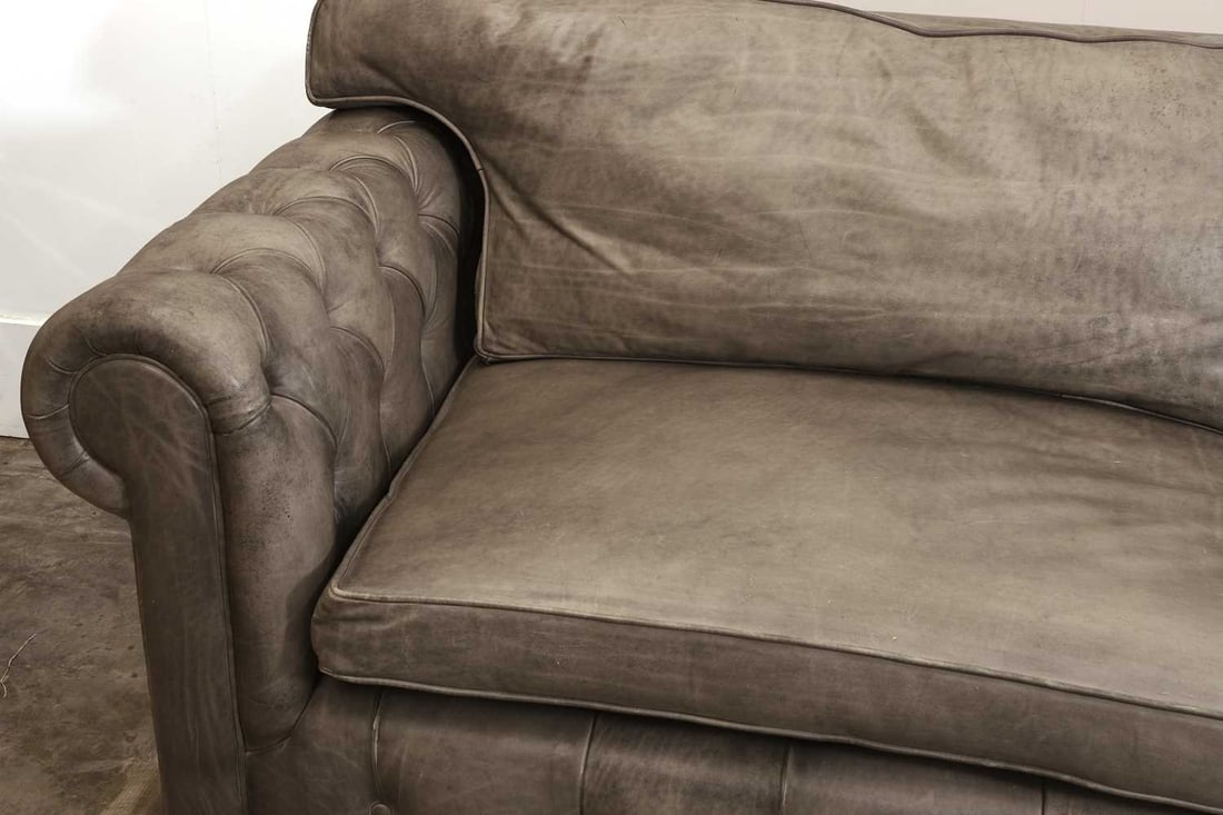 A large grey leather upholstered chesterfield sofa, of recent manufacture, - 2