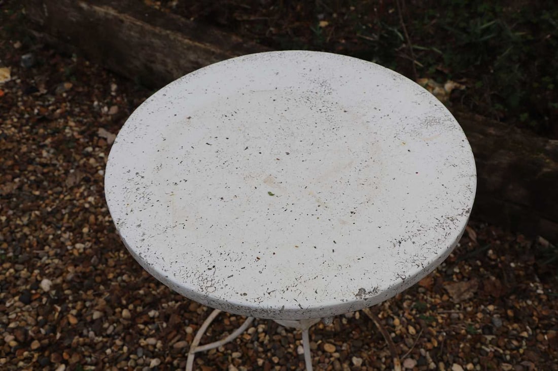A painted metal garden table, 20th century, - 2