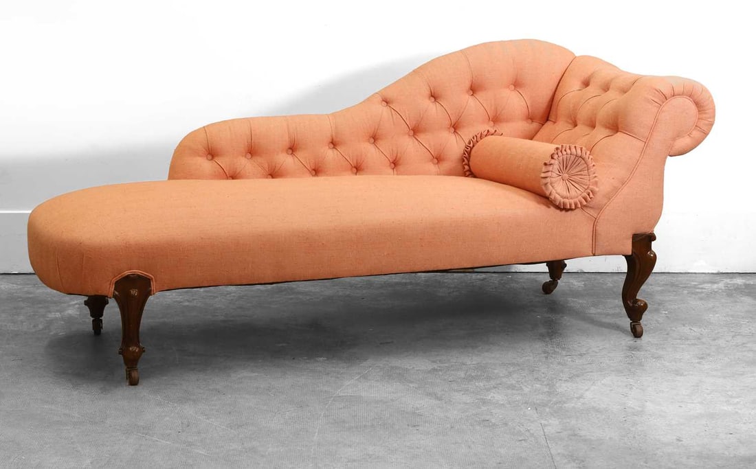 A Victorian walnut framed chaise longue, late 19th century,: A Victorian walnut framed chaise longue, late 19th century, with single scroll end, on cabriole legs to scroll feet and brass casters, 70cm wide, 190cm long, 80cm high,