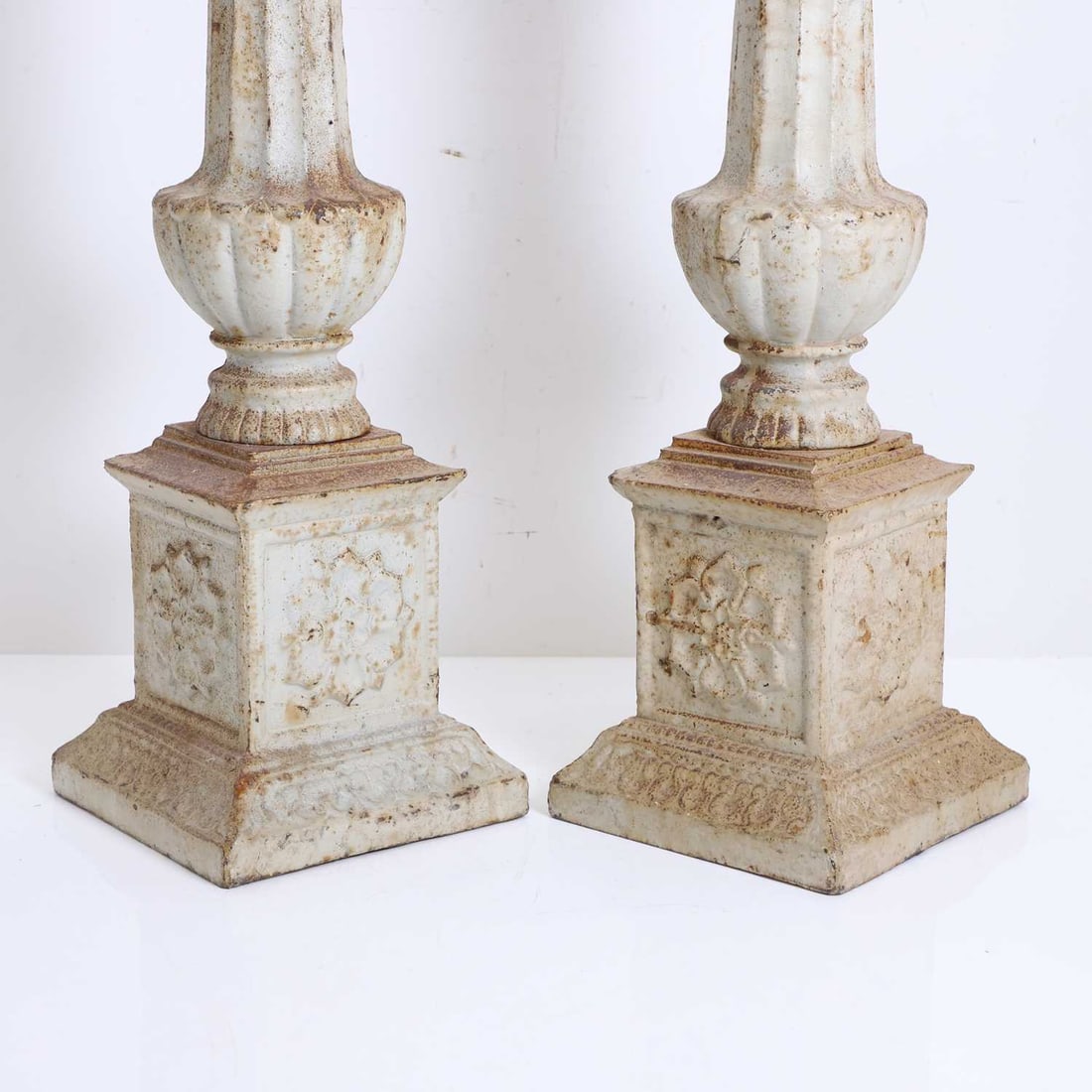 A pair of large French cast iron candle stands, circa 19th century, - 2