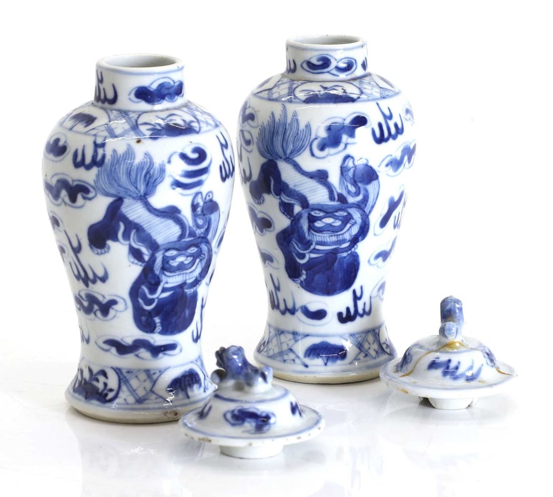 A pair of Chinese blue and white vases and covers, late 19th century, - 2