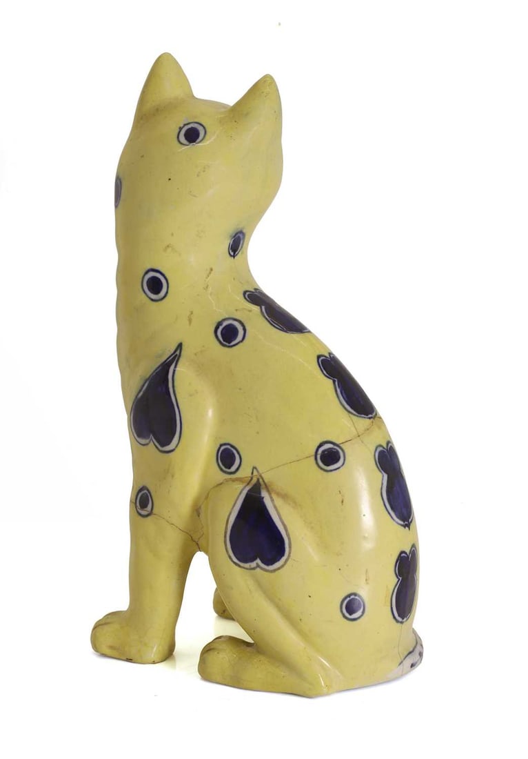 A French Faience figure, c.1900, - 2
