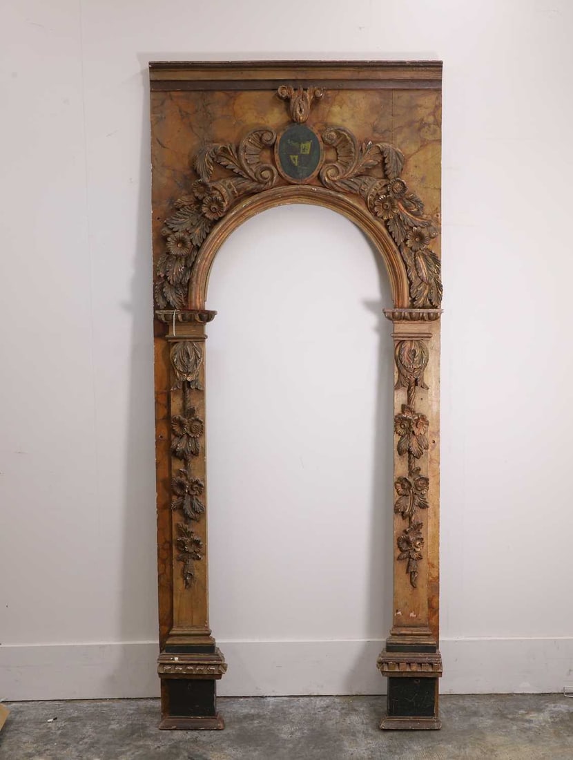 A Spanish faux marble decorated architectural archway, circa 18th century,: A Spanish faux marble decorated architectural archway, circa 18th century, of arched form, the central opening flanked by pilaster uprights apllied with floral swags and foliate ornament, the arch enr