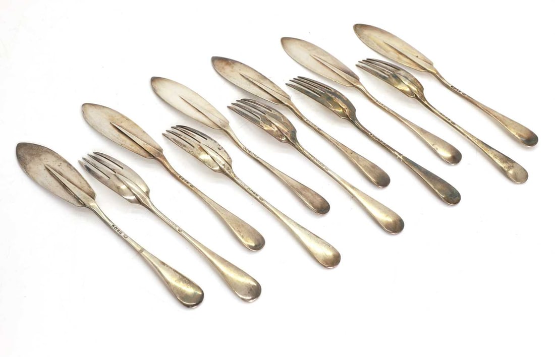A group of rat tail Silver fish knives and forks, - 2