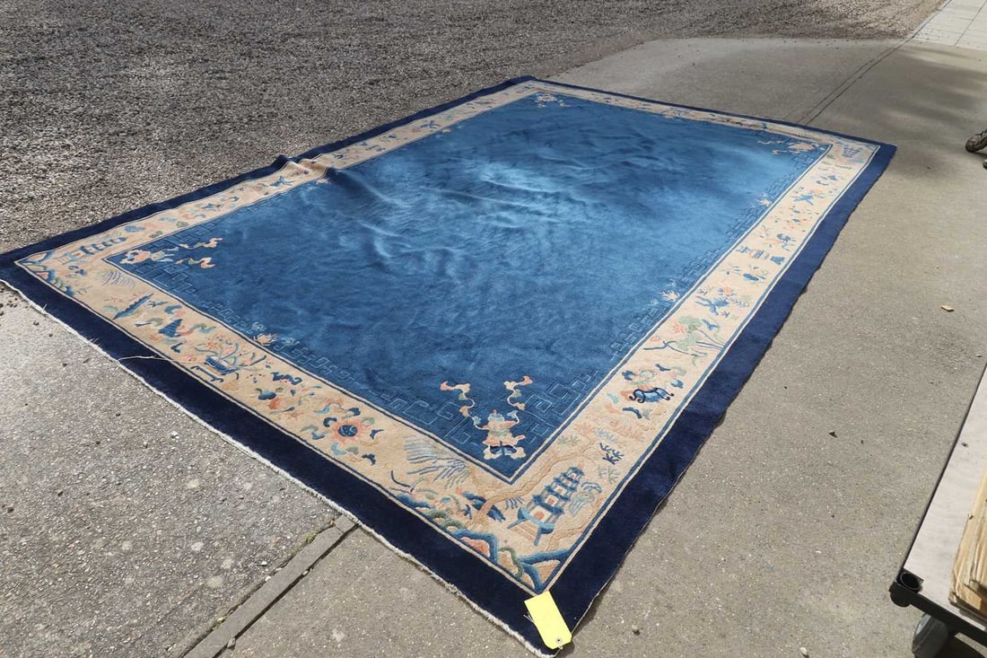 A Chinese wool rug, early 20th century, - 2