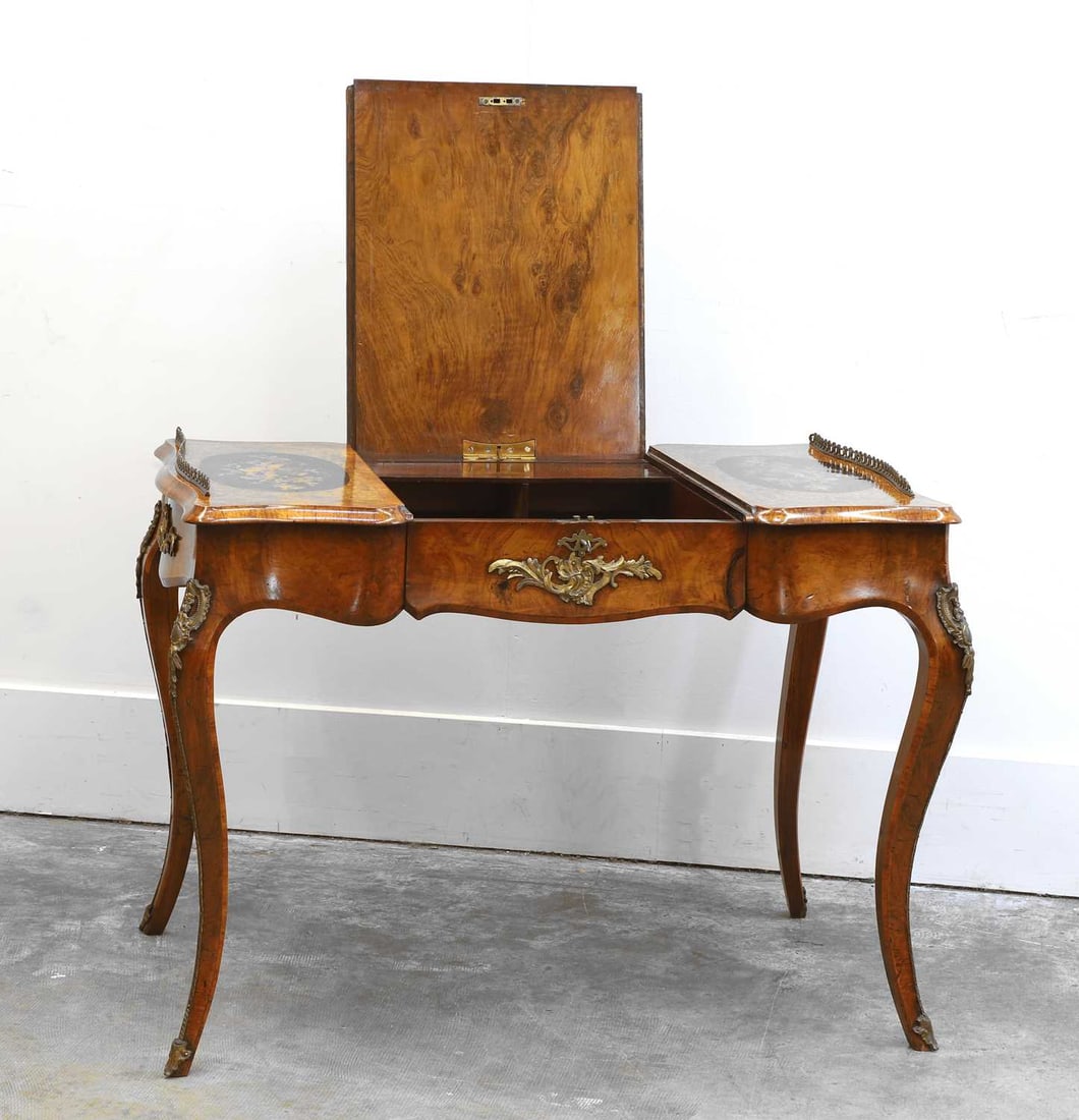 A Louis XV style walnut and crossbanded shaped top bureau plat, c.1860, - 2