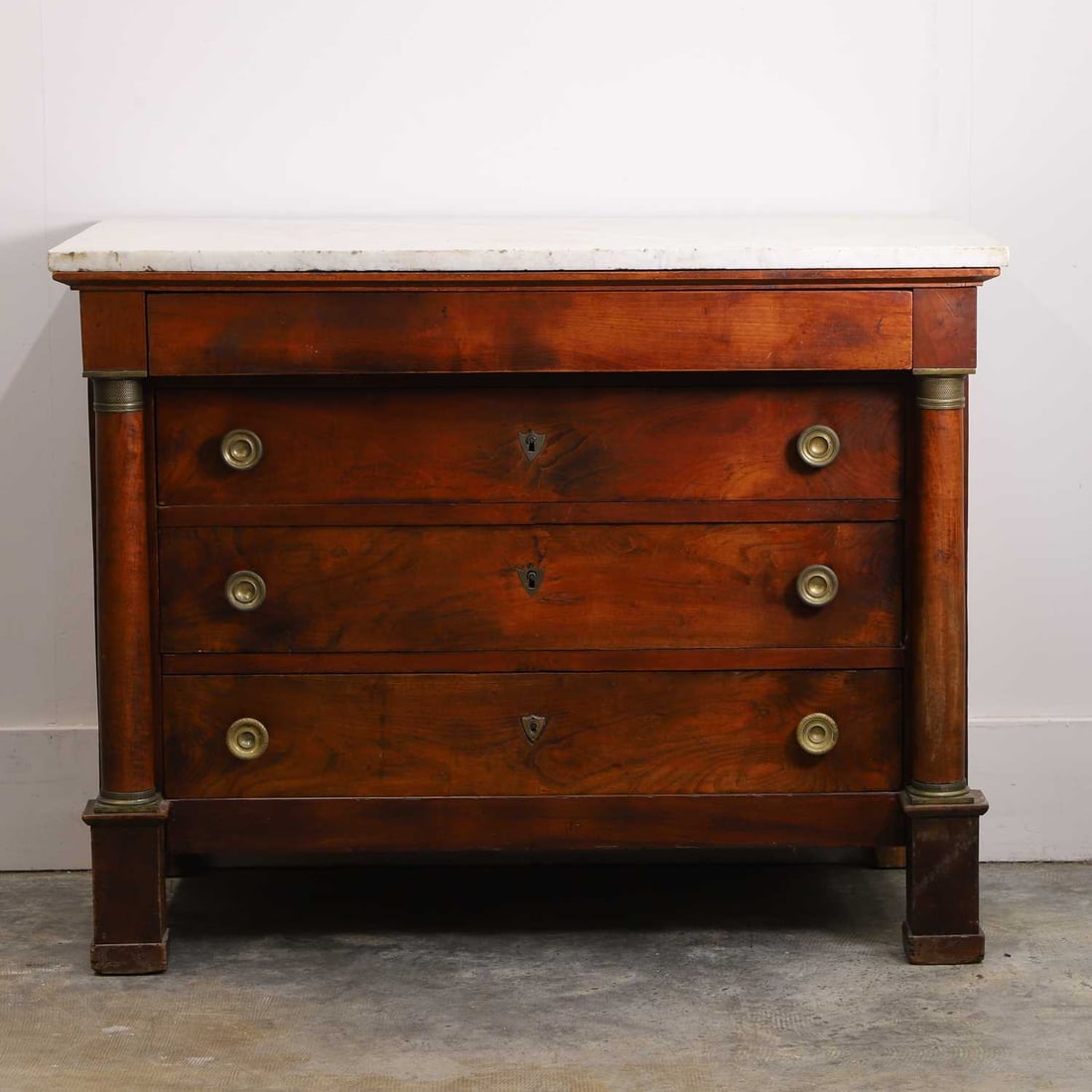 A French Empire 'tréfle' commode, early 19th century, - 2