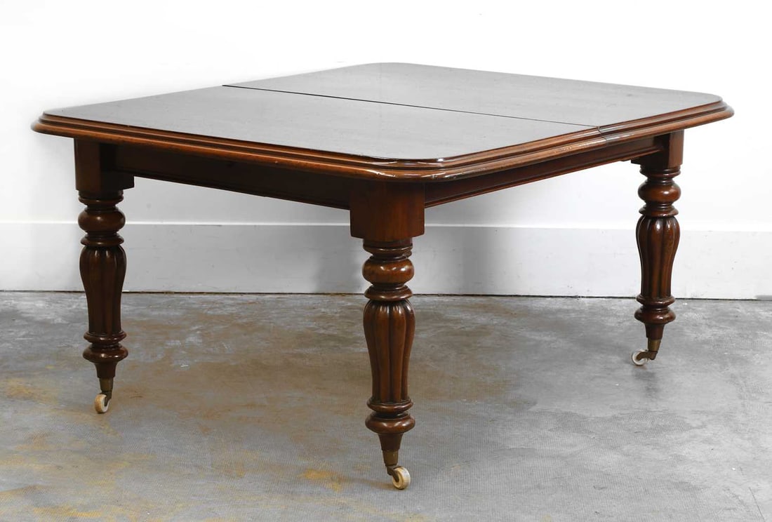 A mahogany extending dining table, 19th century, - 2