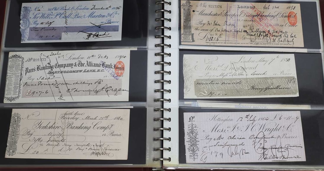 An extensive collection of cheques, - 12