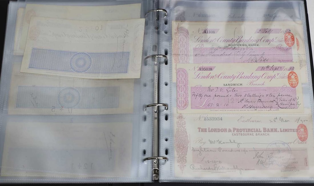 An extensive collection of cheques, - 17