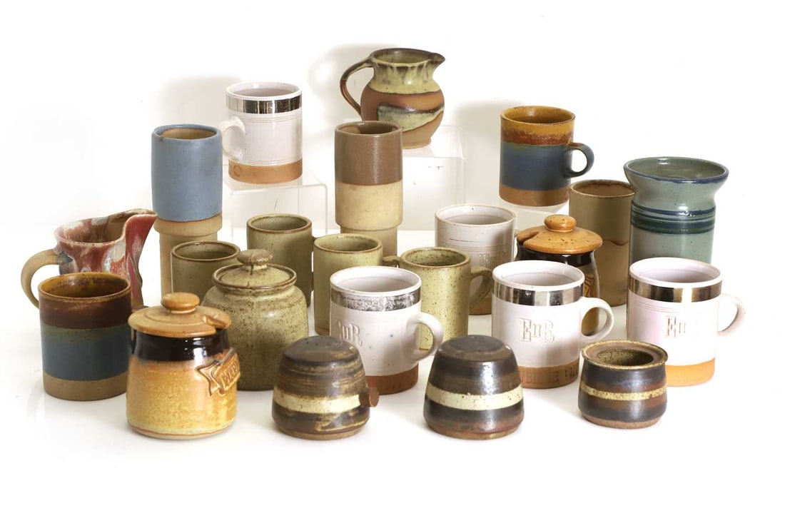A collection of studio pottery: A collection of studio pottery to include a pair of stoneware Silver Jubilee commemorative mugs, impressed marks, and another three of a similar design, together with other studio ceramics jugs and va
