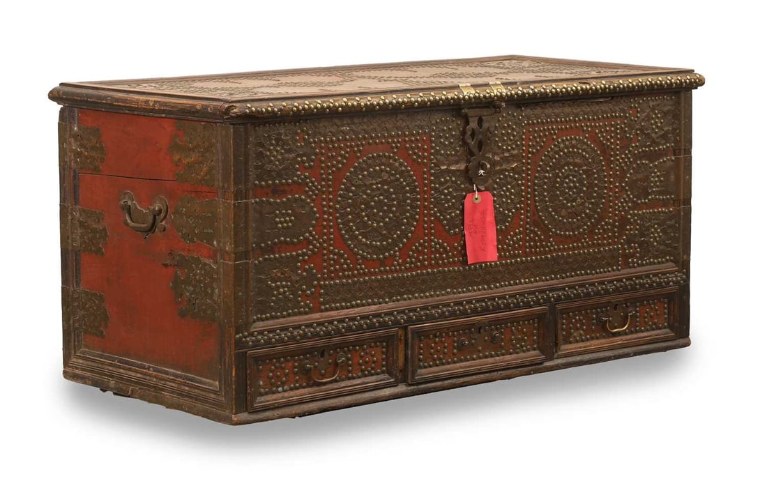 A hardwood and brass-mounted Zanzibar chest, 19th century,: A hardwood and brass-mounted Zanzibar chest, 19th century, with studded decoration, the front fitted with three drawers 108cm wide, 52cm deep, 53cm high Condition Report: With wear and losses. Lock
