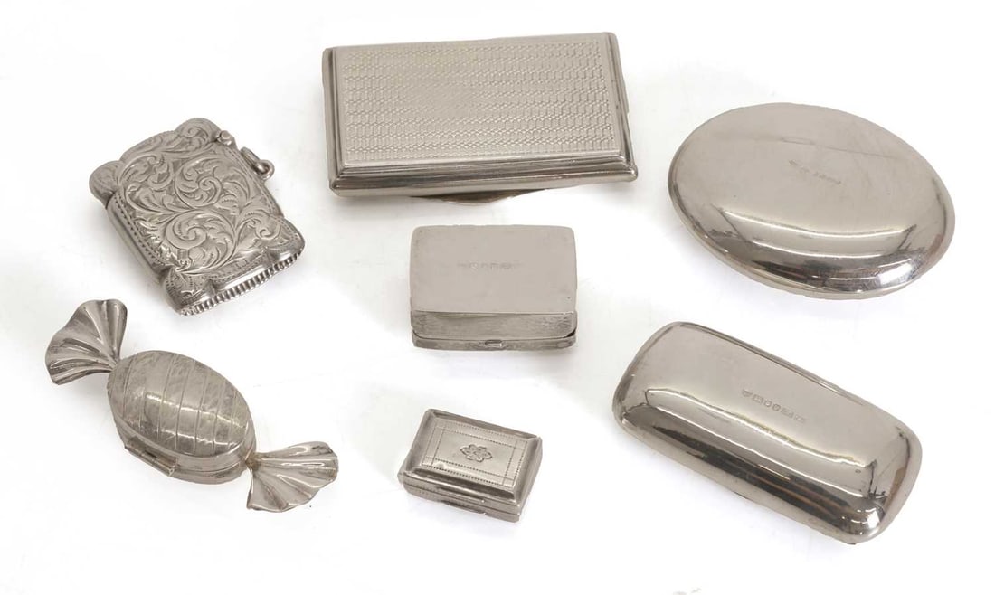 A collection of silver pill boxes, - 2