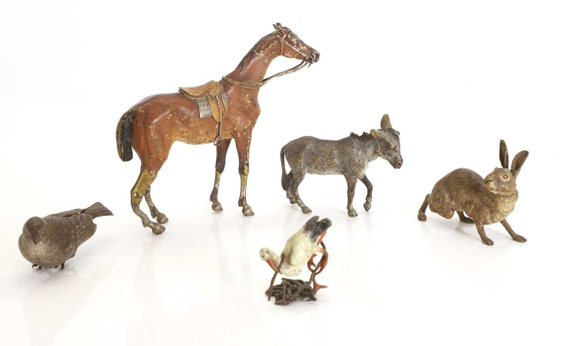 A group of Austrian cold painted animals, 20th century,: A group of Austrian cold painted animals, 20th century, bronze, including a stork, saddled horse, donkey, hare and a cuckoo, of varying scale largest 15cm high 5