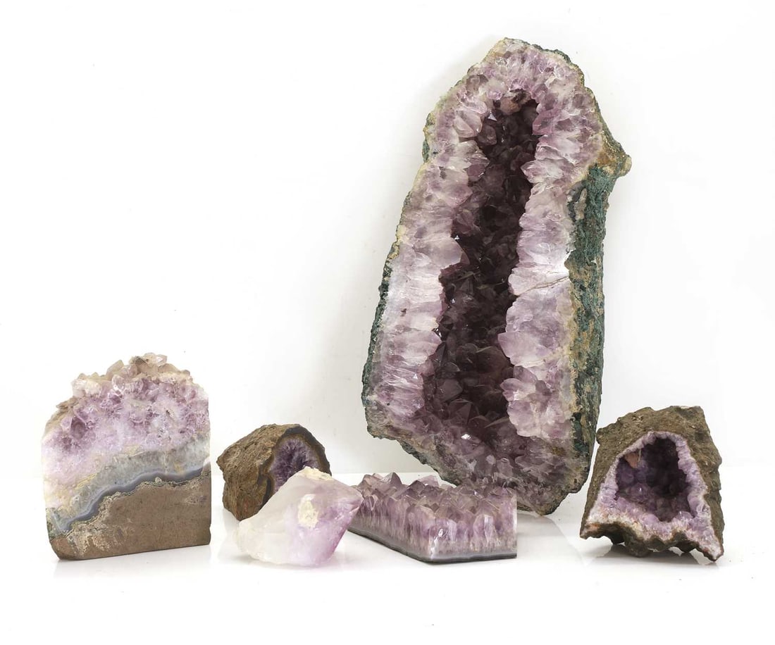 A large amethyst pillar: A large amethyst pillar together with a group of other amethyst fragments largest 40cm high 10