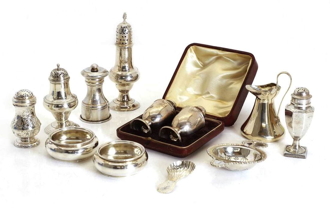 A collection of George III silver cruets, - 2