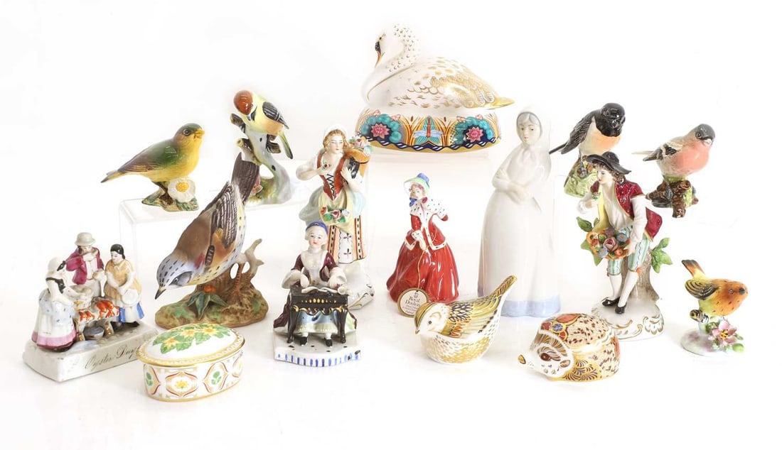 A collection of porcelain items,: A collection of porcelain items, to include a Royal Crown Derby porcelain 'Nesting Swan' paperweight with silvered stopper, with two further Royal Crown Derby paperweights, together with three