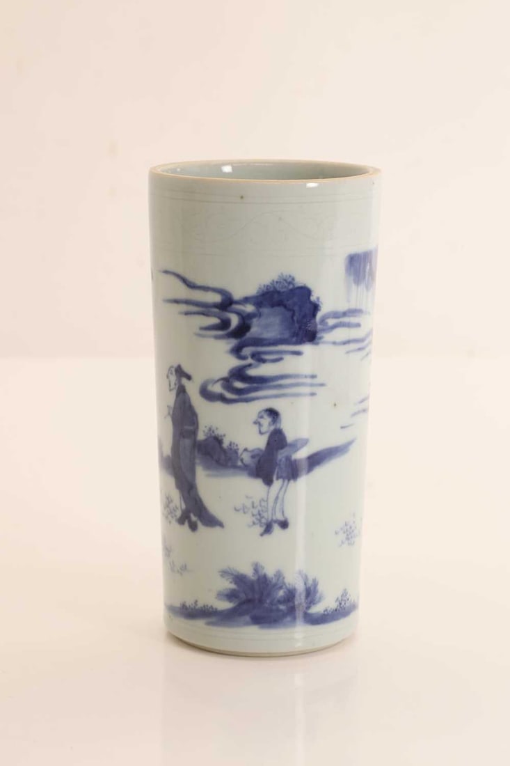 A Chinese blue and white cylindrical brush pot, 20th century,: A Chinese blue and white cylindrical brush pot, 20th century, painted with a landscape scene 16.5cm high