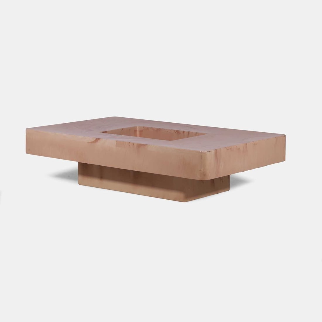 Manner of Willy Rizzo, a coffee table,: Manner of Willy Rizzo, a coffee table, circa 1970s, resin with a faux marble finish, with a recessed central well and a broad top that sits above a block base 129cm wide, 79cm deep, 32.5cm high