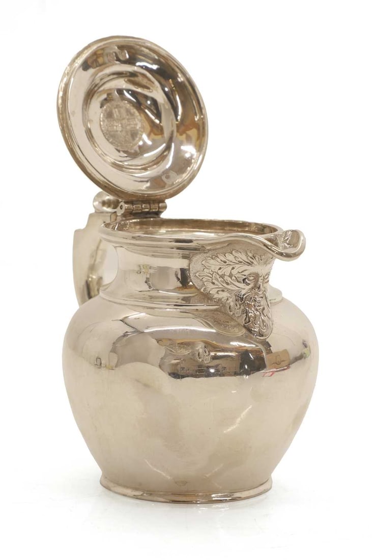 A silver lidded masked jug, circa.1900 - 5