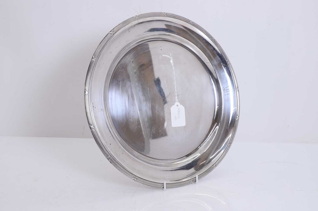 A silver-plated salver, 20th century, - 2