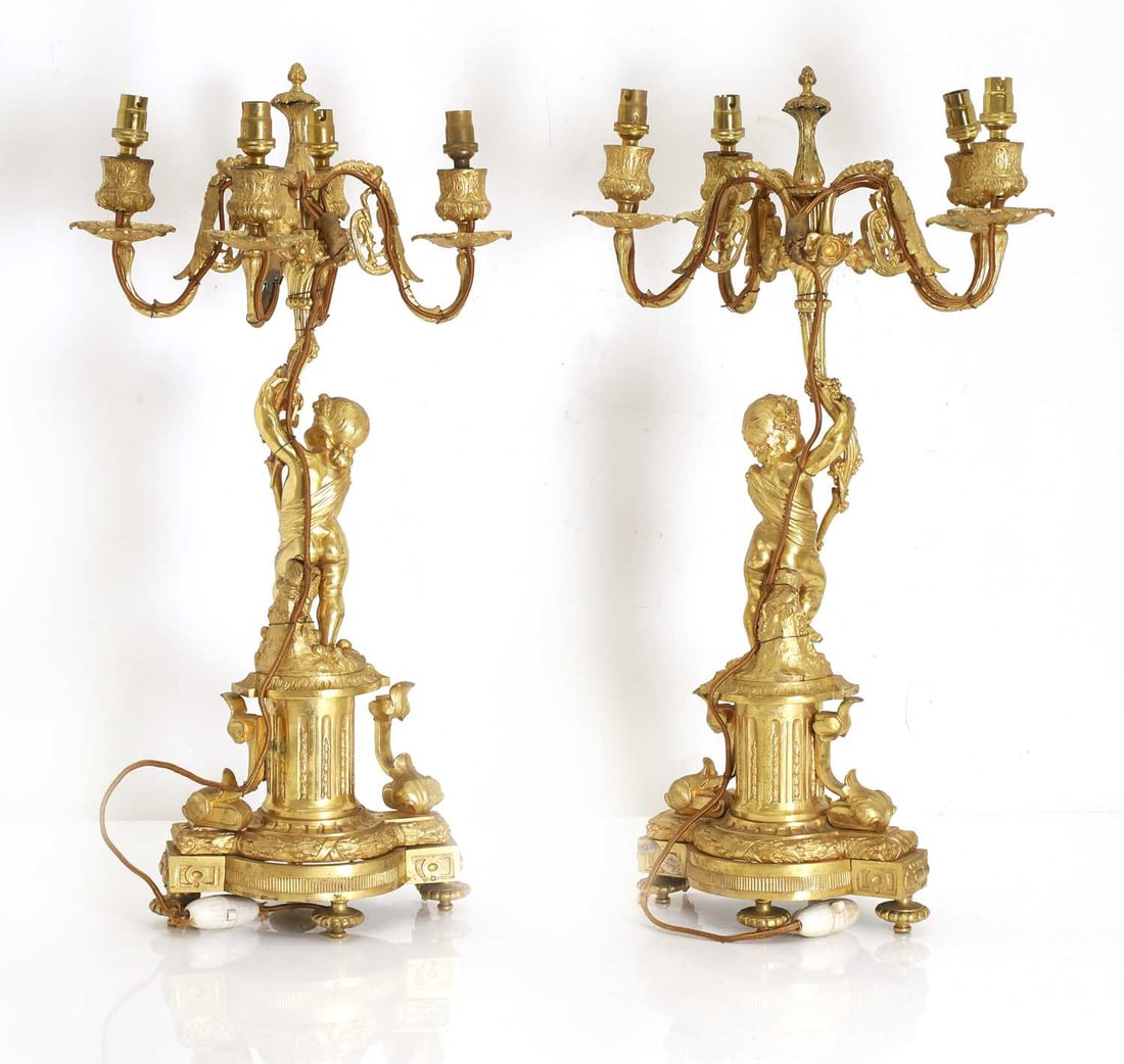 A pair of gilt brass Louis XVI style ormolu brass figural table candelabra, 19th century, - 2