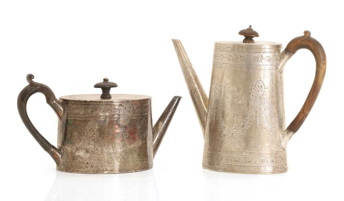 A part tea and coffee silver service,: A part tea and coffee silver service, with brightcut floral motifs, swags and cartouches throughout, the side cartouche decorated with a bow above a horn on each, with scrolling hardwood handles 23cm 