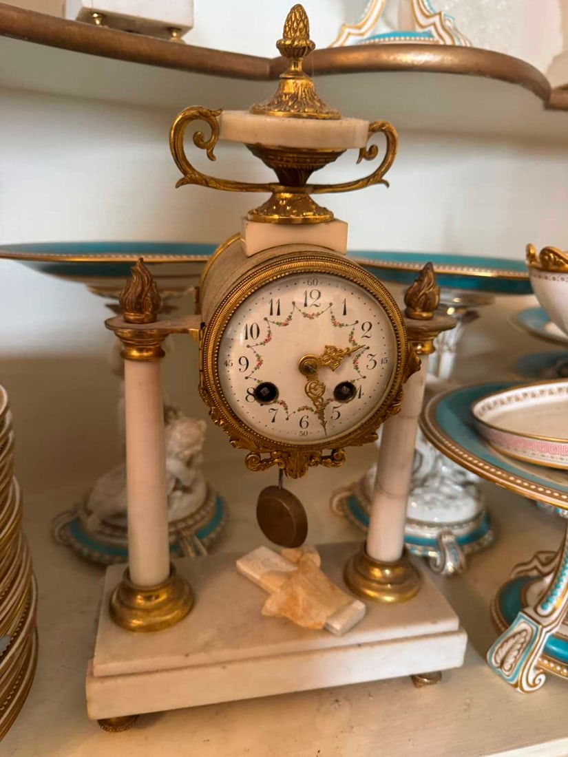 A gilt and marble clock garniture, late 19th century, - 2
