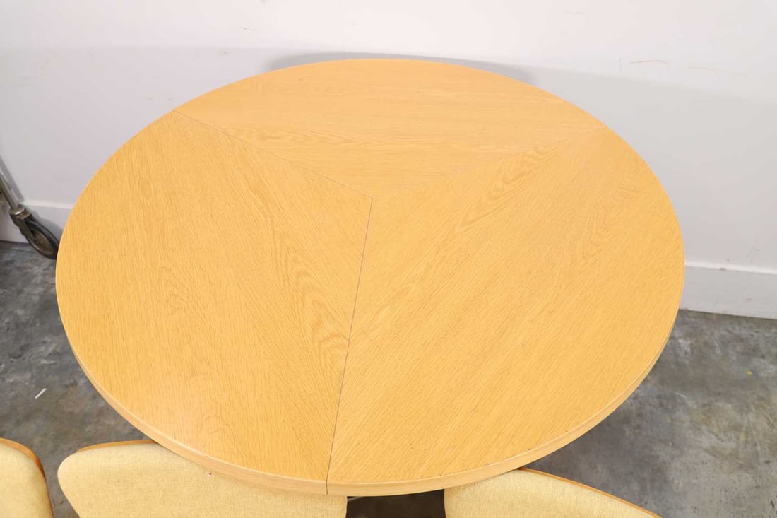 A Contemporary oak circular dining table and chairs, - 3