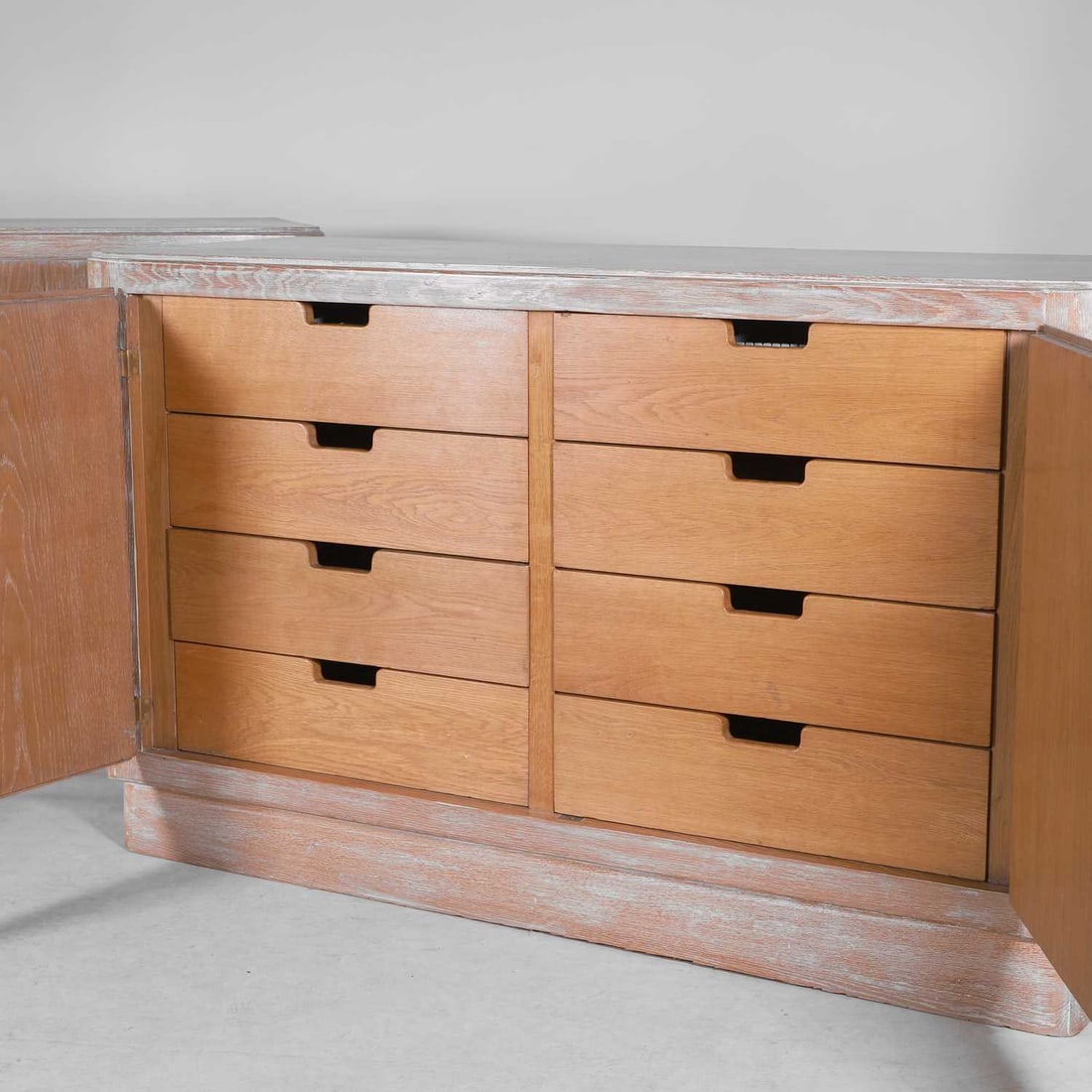 Jacques Adnet (French, 1900-1984), a pair of limed oak cabinets, - 2