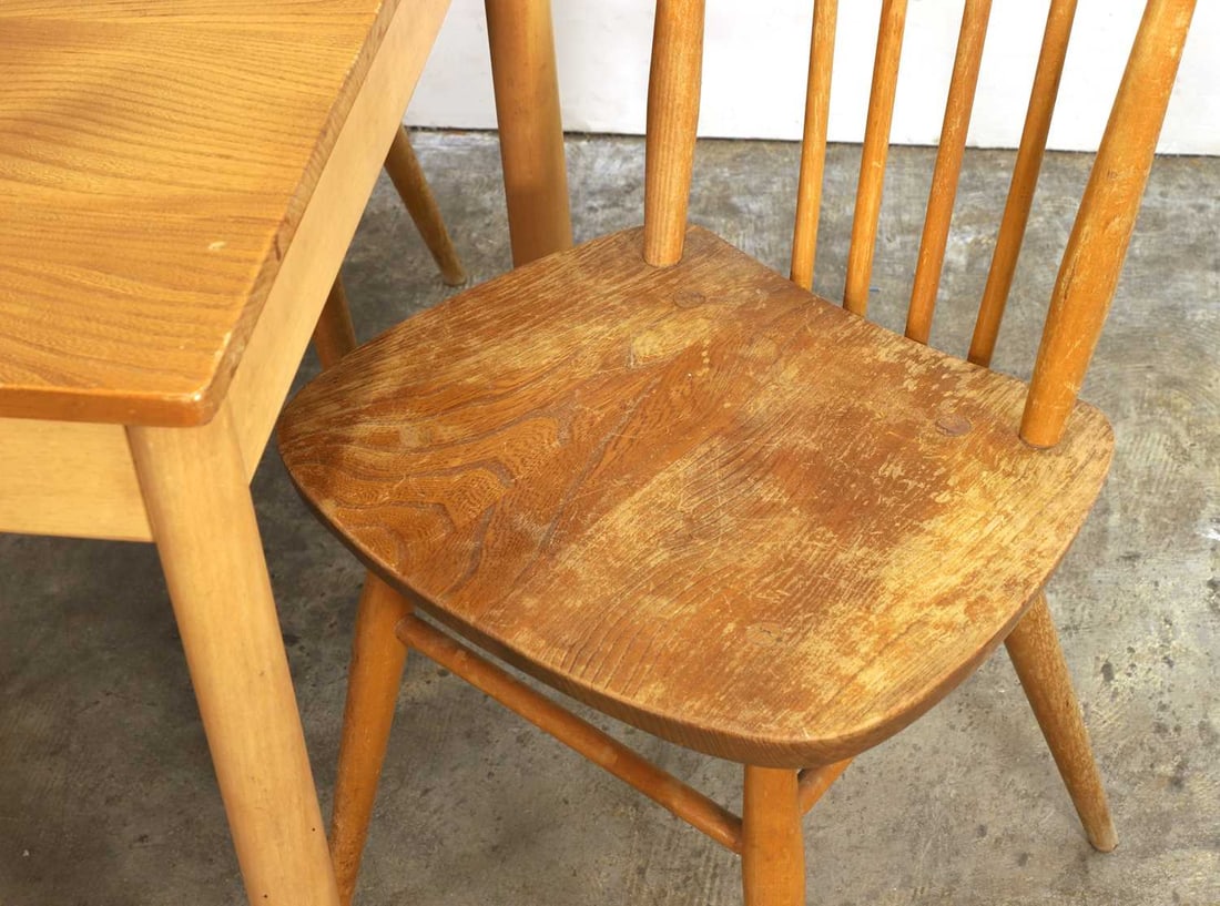 An Ercol blonde elm dining suite, 20th century, - 2