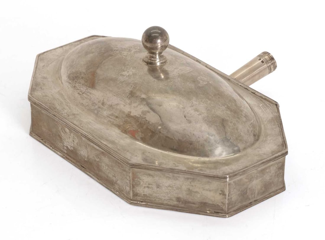 A heated silver serving dish, (1 of 2)