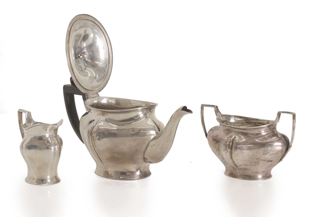 A silver three piece tea set, by Henry Stratford Ltd, Sheffield, 1910 - 2