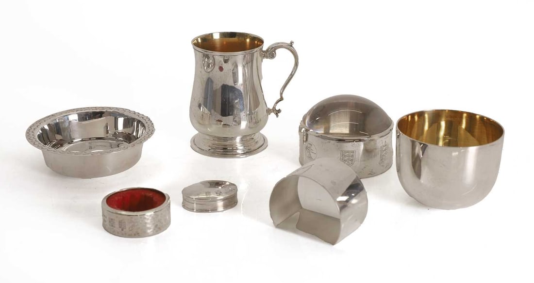 A collection of Guernsey silver,: A collection of Guernsey silver, to include a silver tumbler with gilded interior, with maker's mark and stamped '925', a silver napkin ring, a silver dish with incised decoration to the rim, a