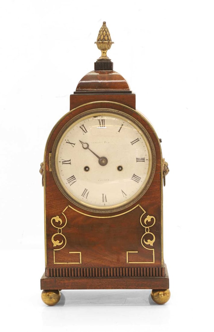 Charles Pratt, a brass-inlaid mahogany mantle clock, 19th century,: Charles Pratt, a brass-inlaid mahogany mantle clock, 19th century, the painted dial with Roman numerals, with a twin fusee movement, striking the hour on a bell, minute hand loose 17.5cm wide, 11cm de