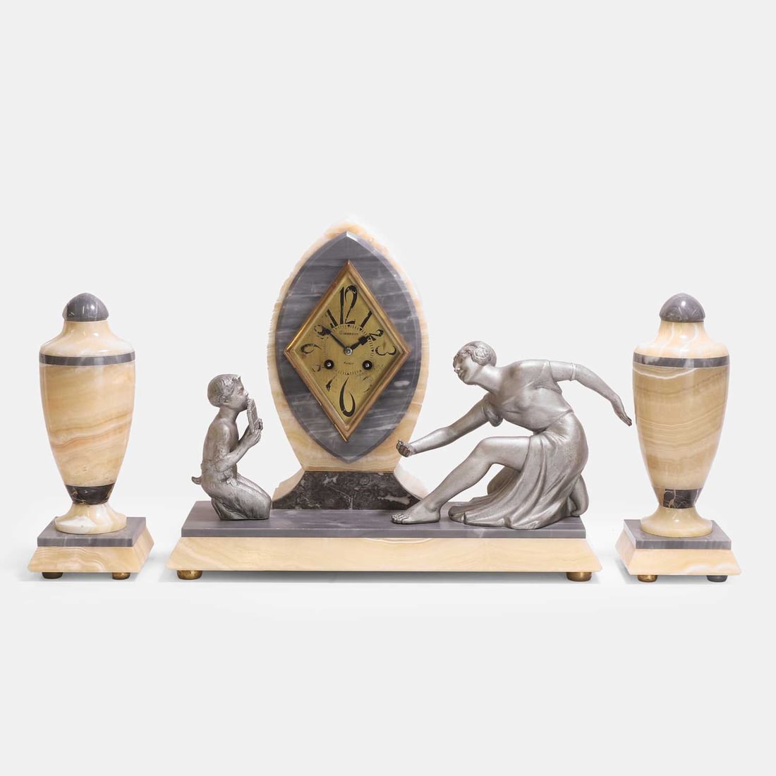 Art Deco clock garniture, a marble clock garniture,: Art Deco clock garniture, a marble clock garniture, circa 1920-30, the shaped clock with a lozenge dial with Arabic numerals, inscribed 'Giradot Nancy', flanked with a young faun playing the pipes and
