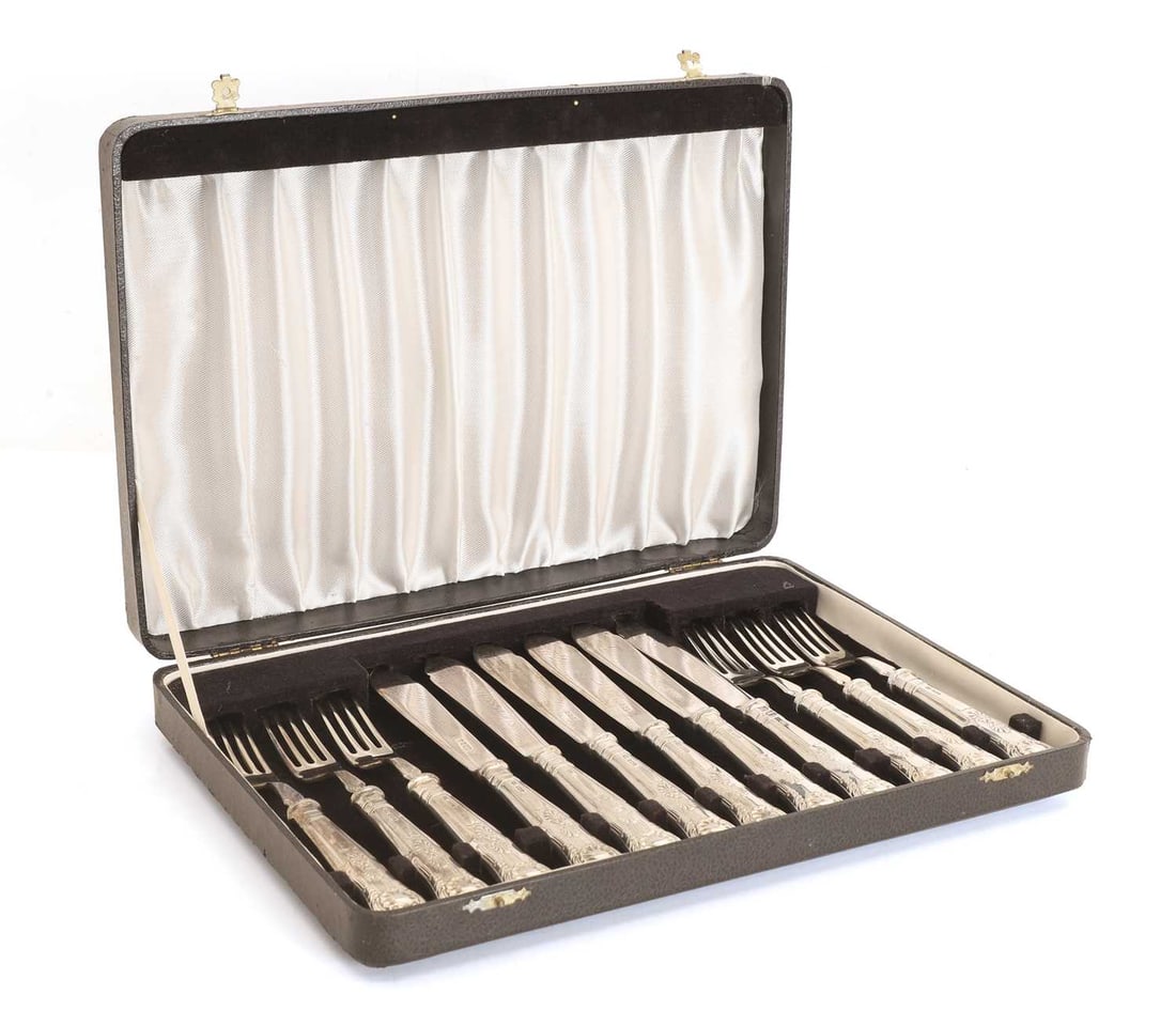 A cased set of silver flatware,: A cased set of silver flatware, the blade stamped, Pinder Brothers, Sheffield, 1971, and the handles stamped, by F B, Sheffield, 1971, King's pattern, comprising of six forks and six knives total 25.7