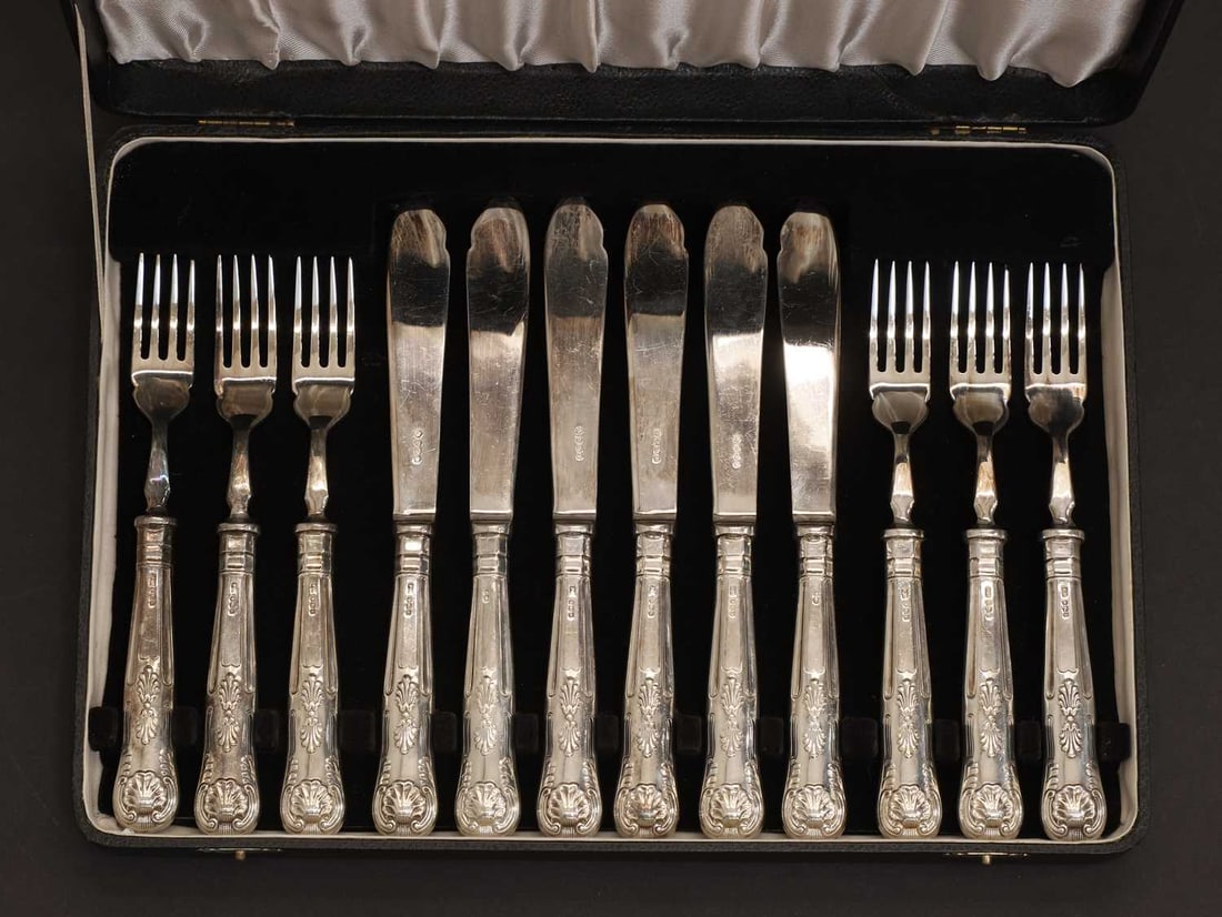 A cased set of silver flatware, - 2