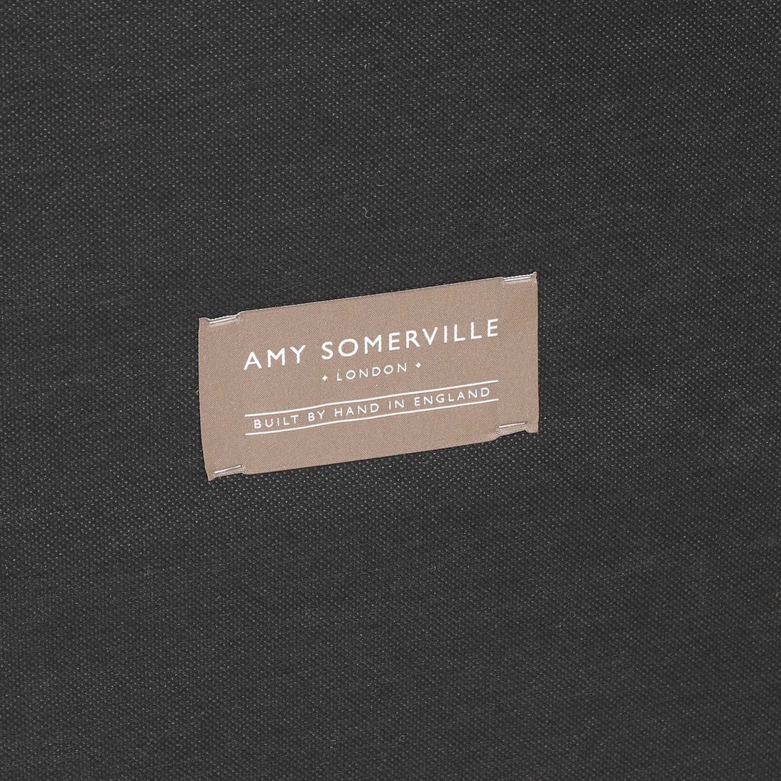 Amy Somerville, a sofa, - 5