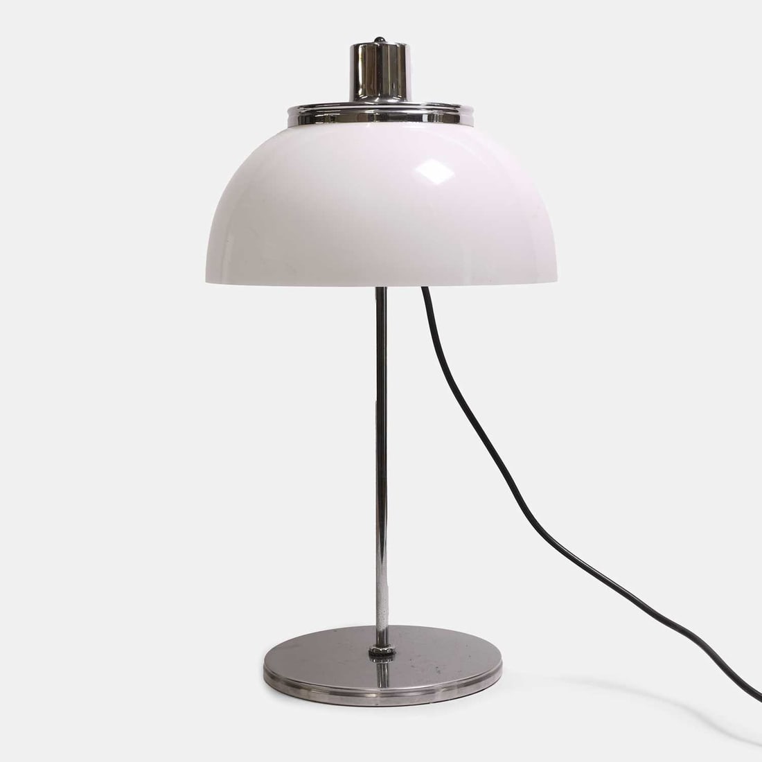 Luigi Massoni (Italian, 1930-2013) for iGuzzini, a ‘Faro’ table lamp,: Luigi Massoni (Italian, 1930-2013) for iGuzzini, a ‘Faro’ table lamp, originally designed in 1970, the white domed acrylic shade, raised on a chromed metal tubular stem, over a circular ba