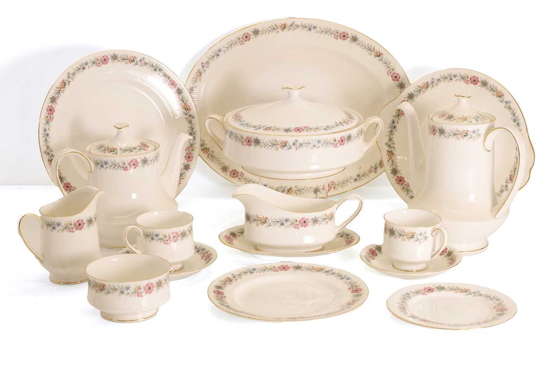 A Royal Doulton Paragon 'Belinda' porcelain tea and dinner service, 20th century,: A Royal Doulton Paragon 'Belinda' porcelain tea and dinner service, 20th century, comprising a teapot, a coffee pot, six teacups and saucers, a cream jug, a sugar bowl, twelve tea plates, six dinner p