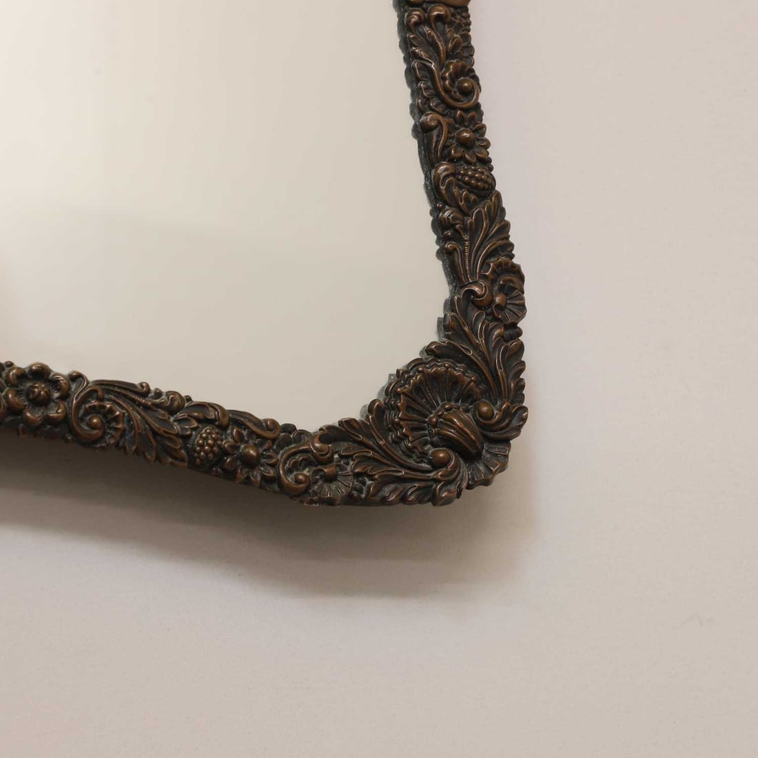 An embossed brass dressing table mirror, early 20th century, - 2