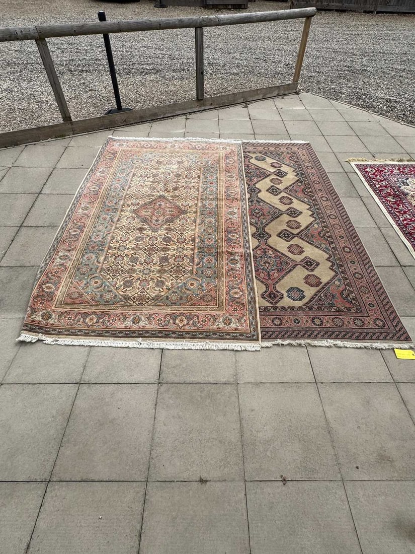 Two Persian style wool rugs, 20th century,: Two Persian style wool rugs, 20th century, each with a cream ground and geometric borders 270 x 168cm and 265 x 165cm approx 2