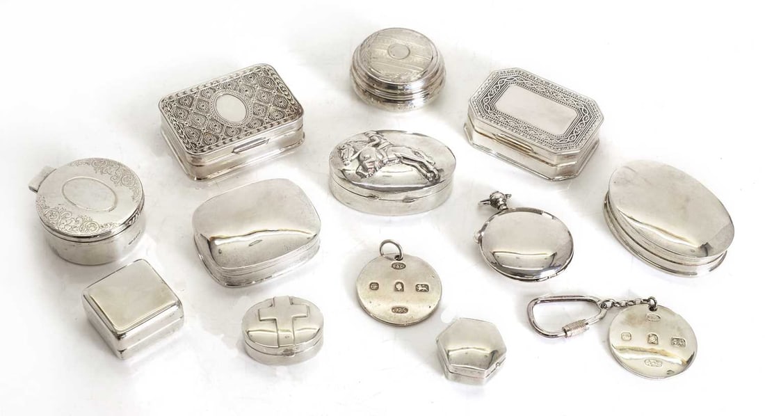 A collection of silver pill boxes, (1 of 1)