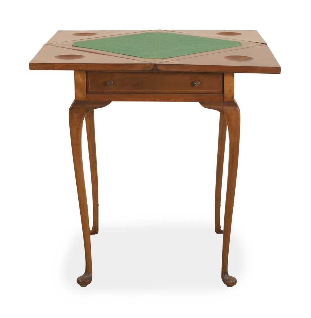 A Victorian mahogany table, 20th century,: A Victorian mahogany table, 20th century, the quatreform lid opening to reveal green baise and the lid with counter holes in, the table supported with cabriole legs, and a single frieze drawer 50cm wi